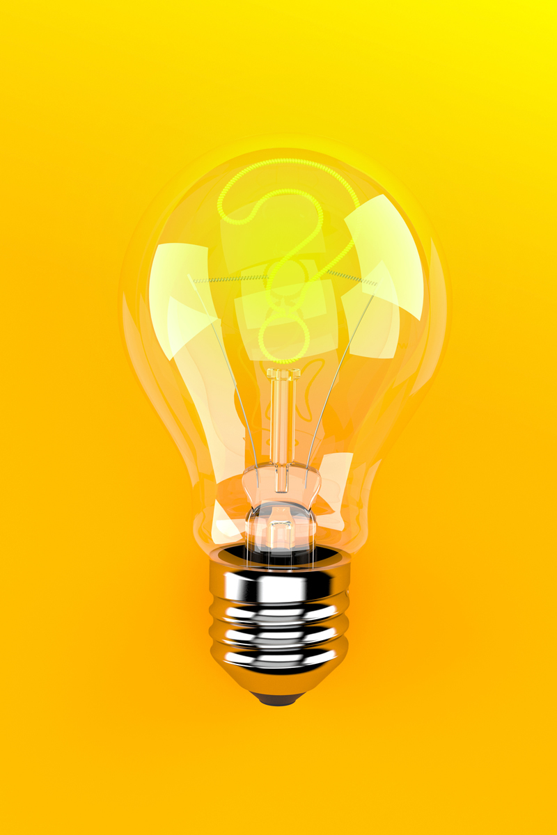 Lightbulb with glowing yellow question mark inside of the bulb on a bright yellow background