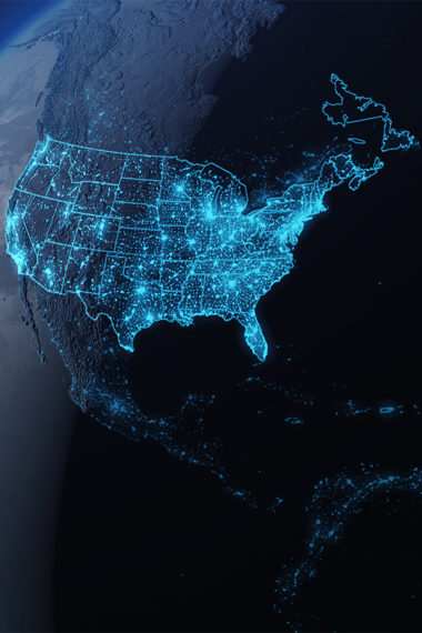 Dark blue illustration of a part of the globe with bright blue lights that illuminate the borders of the United States and the states within the country