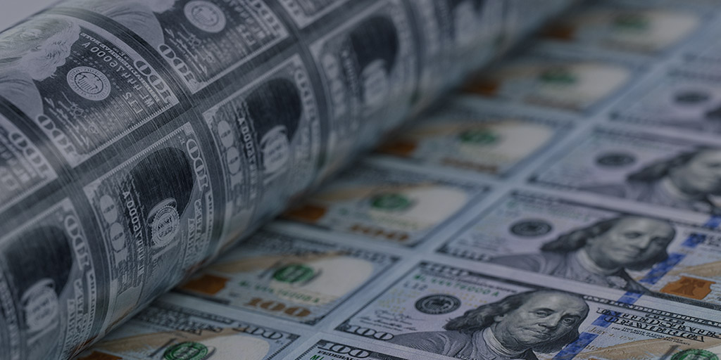Printing of $100 bills with printing plate rolled on the left and images of an uncut sheet of $100 bills on the right