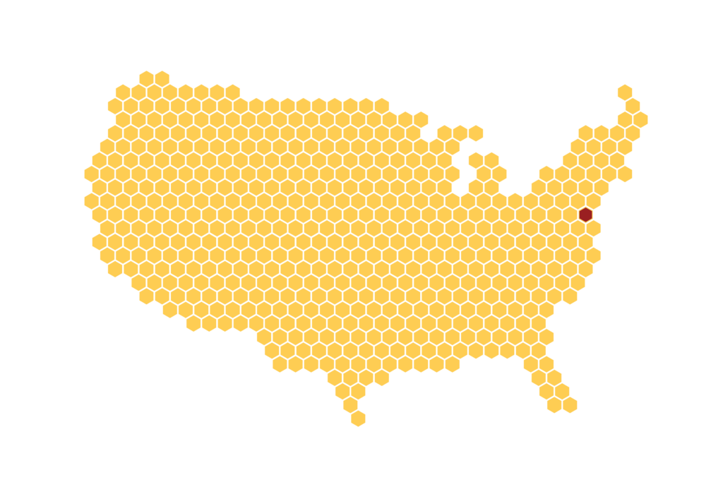 Pixelated illustration of the United states, with yellow hexagon shapes making up the interior map of the country. No words are on the image