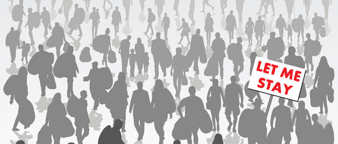 Crowd of displaced people isolated on background with one holding sign with red lettering saying "Let Me Stay"